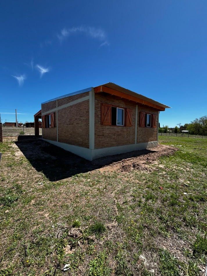 VENTA CASA A ESTRENAR DOS DORMITORIOS PARQUE PROXIMO A RIO Y PERILAGO 