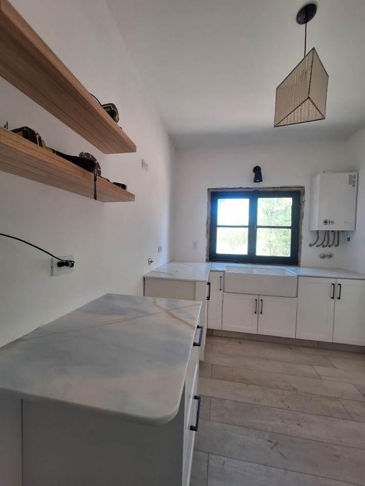 Venta Casa a nuevo en centro Villa Gral Belgrano 