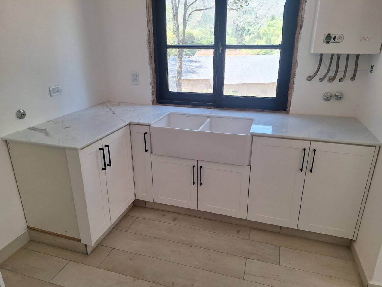 Venta Casa a nuevo en centro Villa Gral Belgrano 